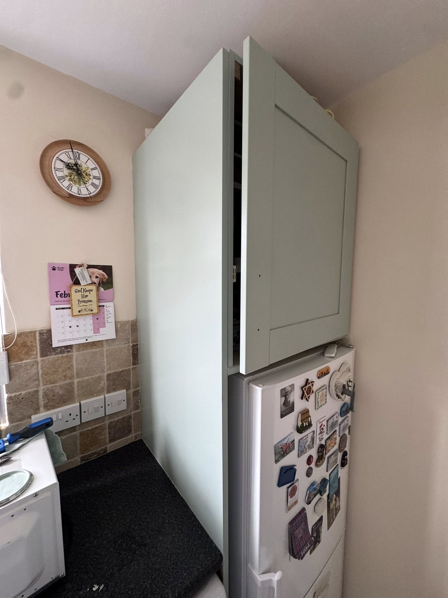 Light green painted cupboards