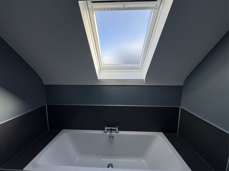 Black and grey painted bathroom